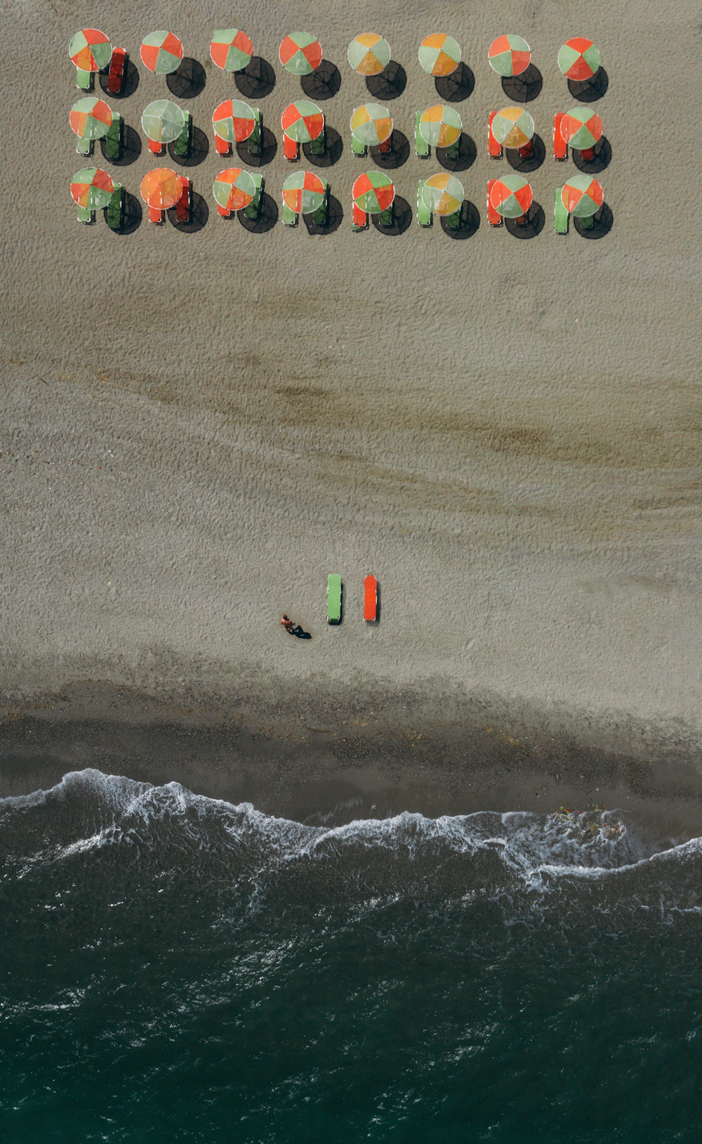 green and white boat on sea water during daytime