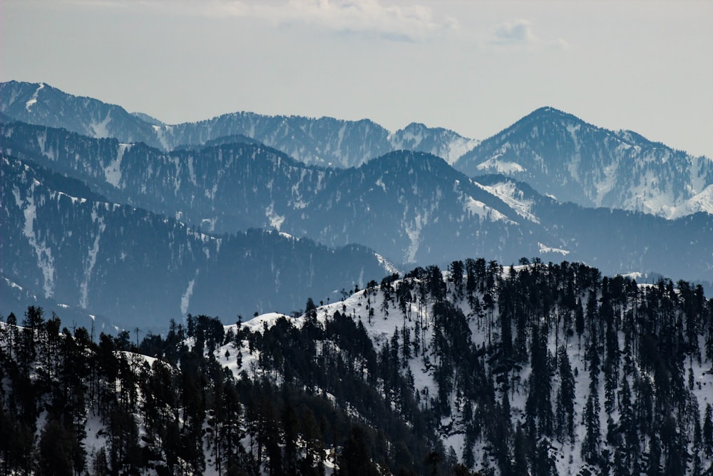 snow covered mountain during daytime