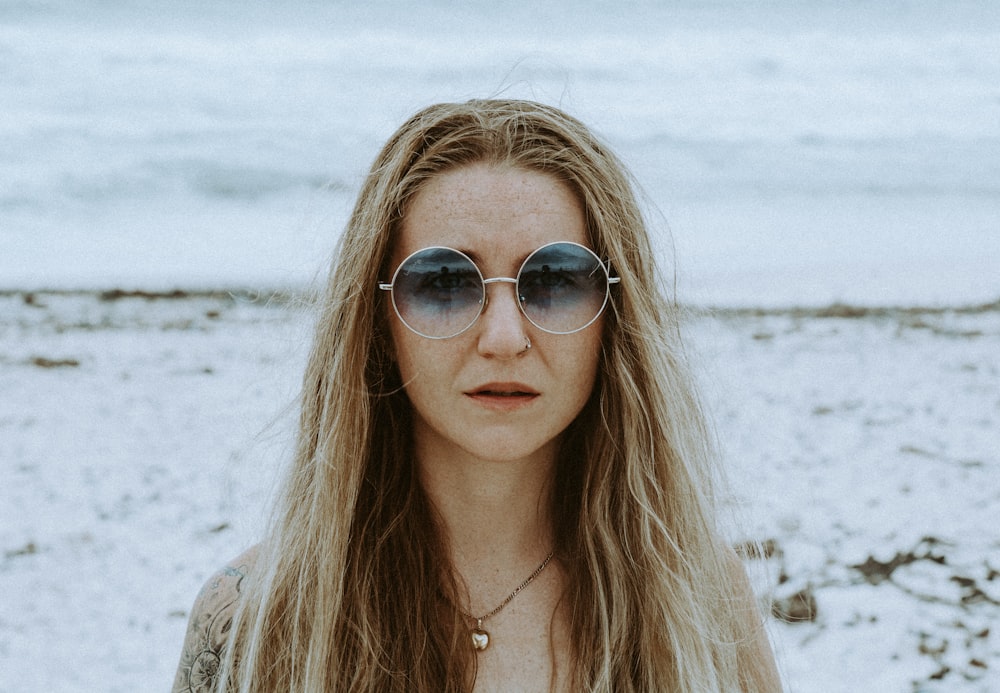 woman in brown framed sunglasses