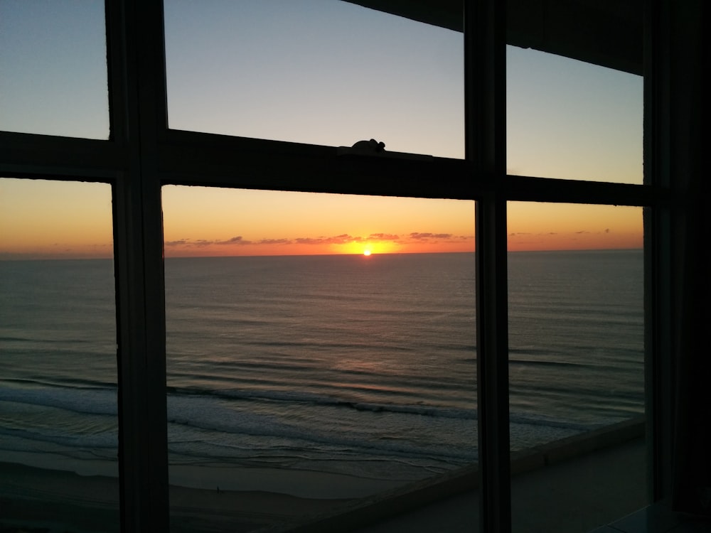 silhouette of window frame during sunset