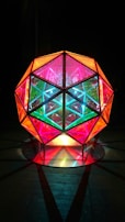 A futuristic sculpture made of translucent materials with embedded LED lights.