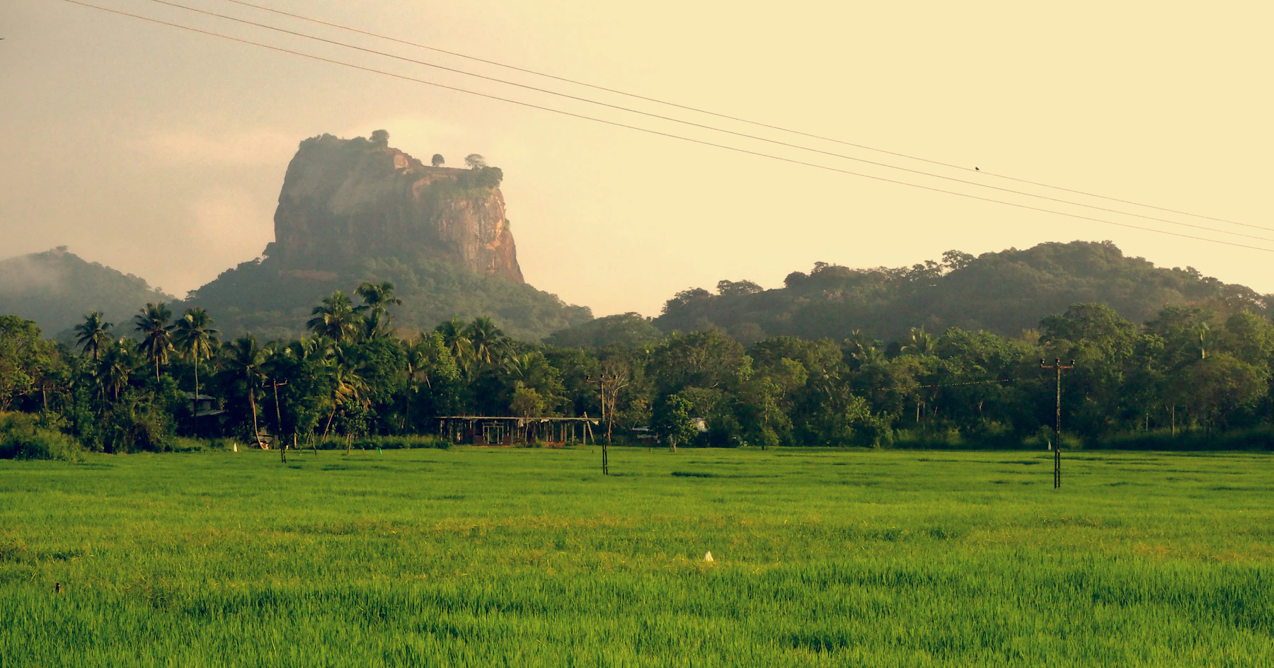 Illustrative travel photograph for this guide: Sigiriya Lion Rock wide landscape