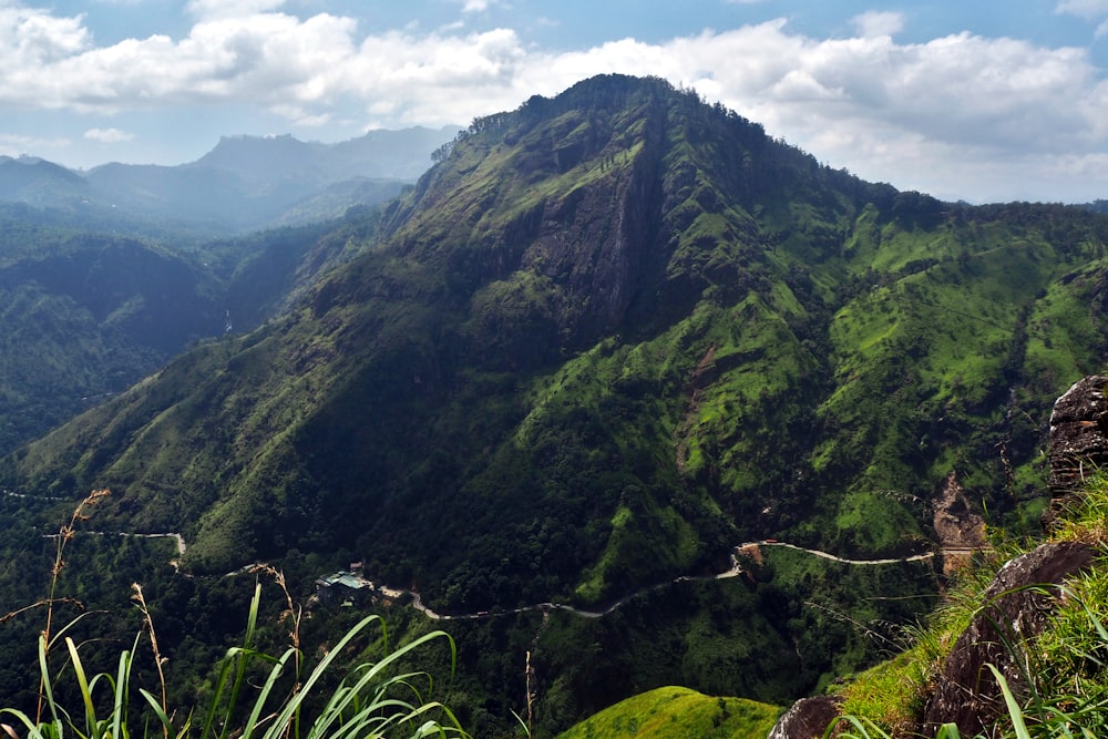 green and brown mountains under blue sky during daytime