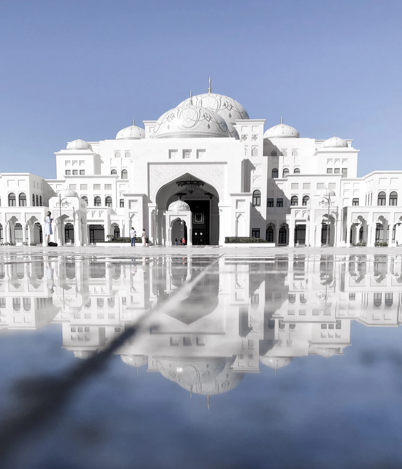 Qasr Al Watan, the presidential palace, reflected in water