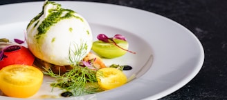 sliced fruit on white ceramic plate