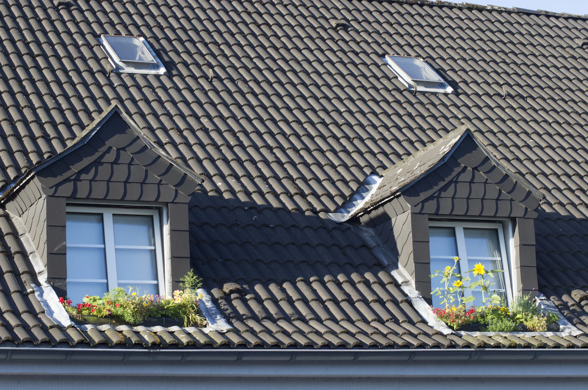 Clean roof tiles after professional roof and gutter maintenance
