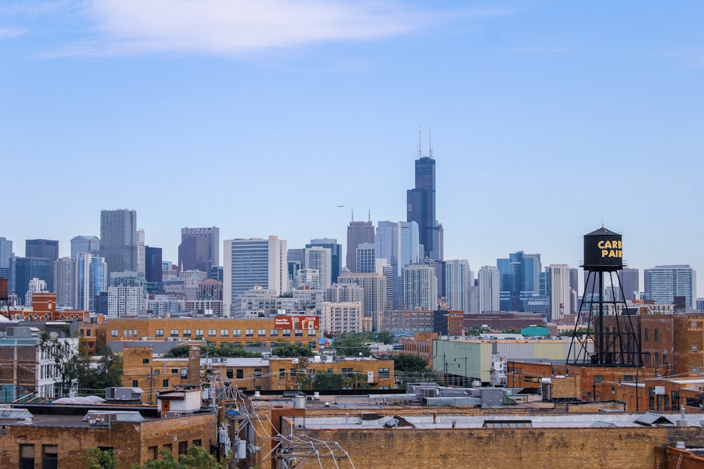 city skyline under blue sky during daytime