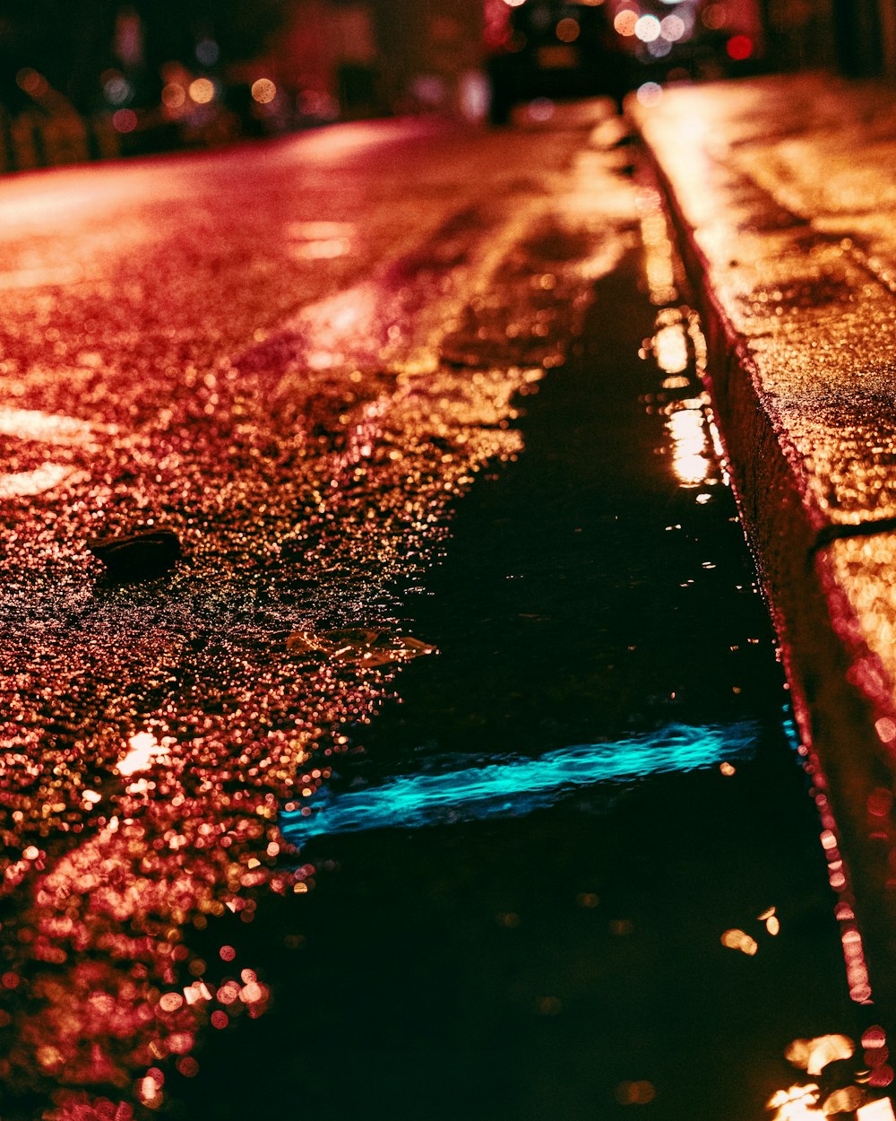 water droplets on brown wooden surface