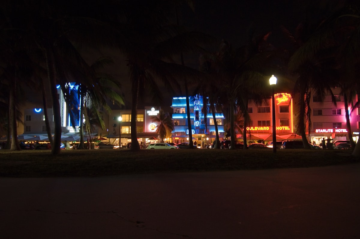 Neon-lit street at night in Miami's South Beach art deco district