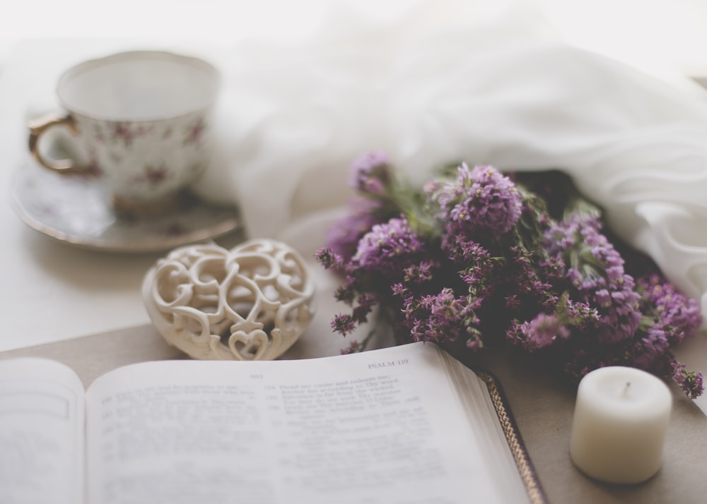 purple flowers on white book page