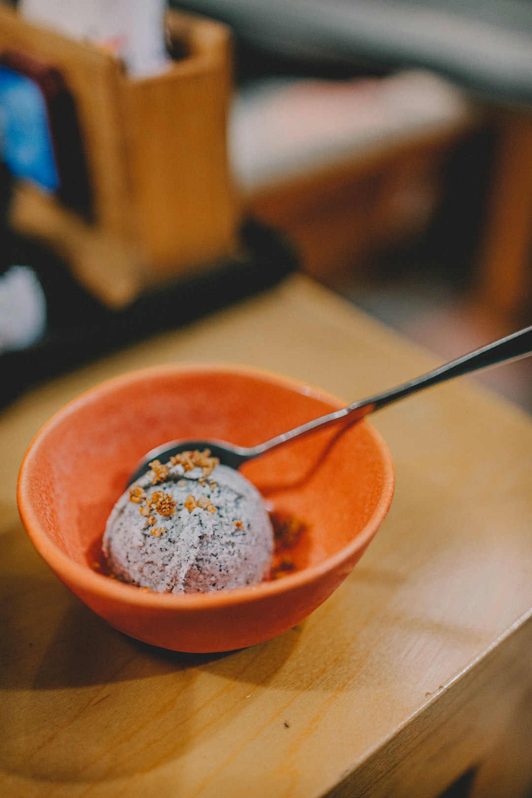 blue ice cream in orange bowl