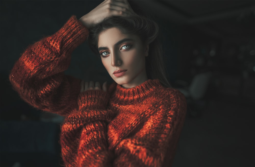 woman in red knit sweater