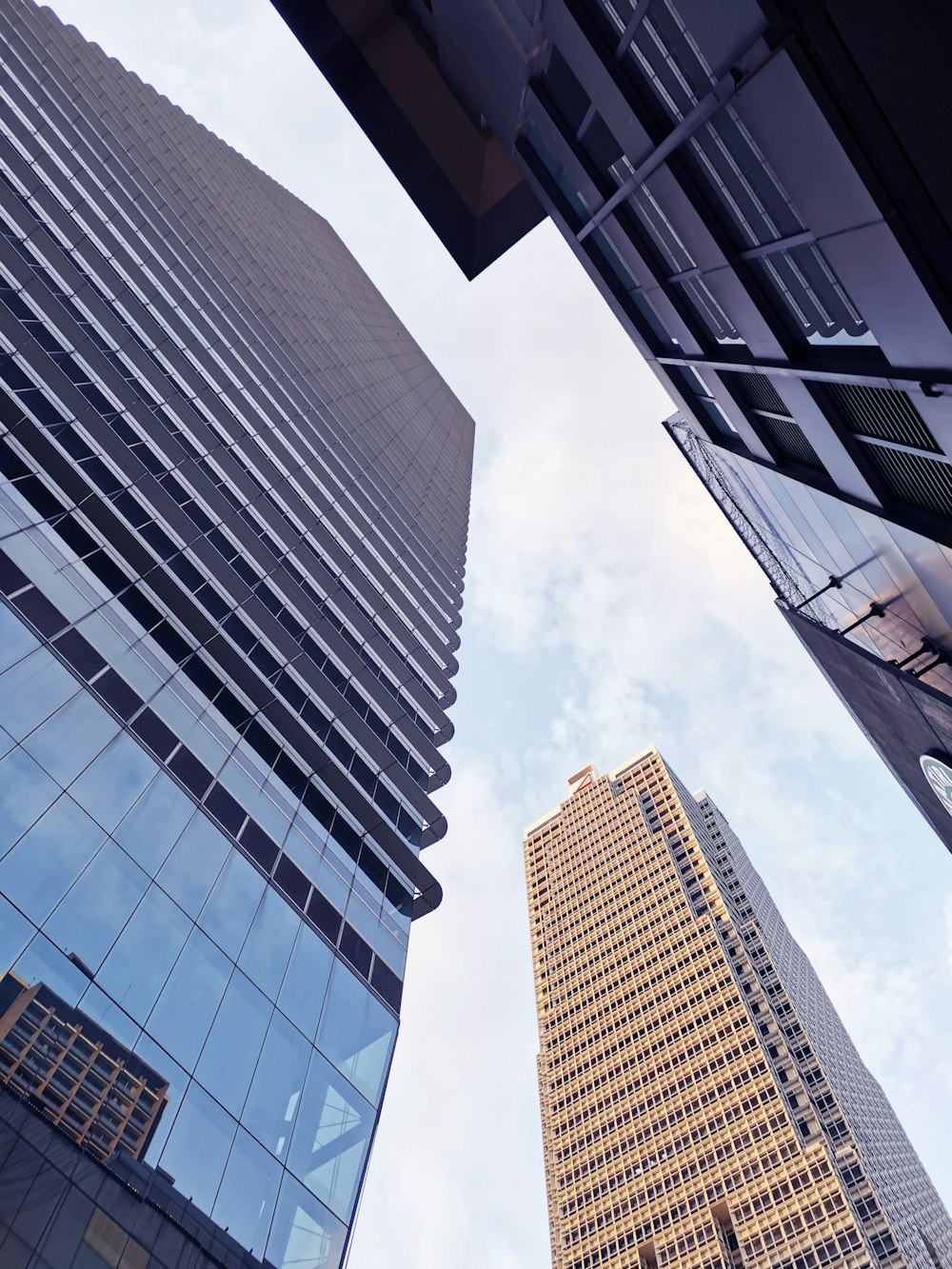 low angle photography of high rise building