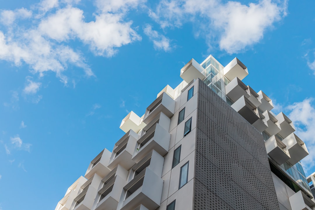 white concrete building under blue sky during daytime