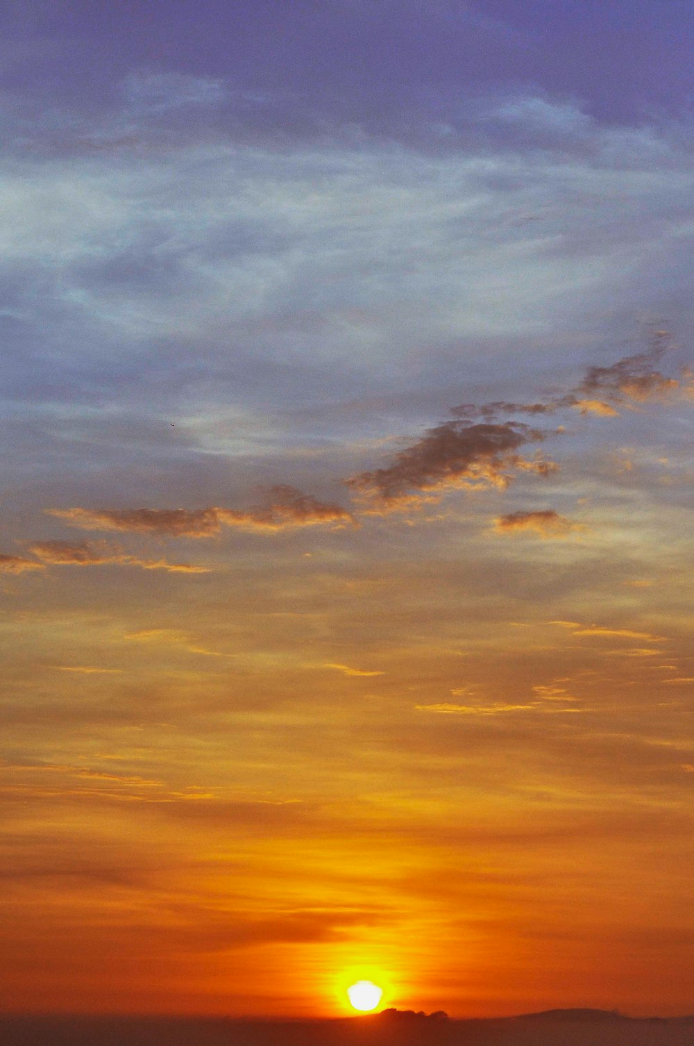 orange and grey clouds during sunset