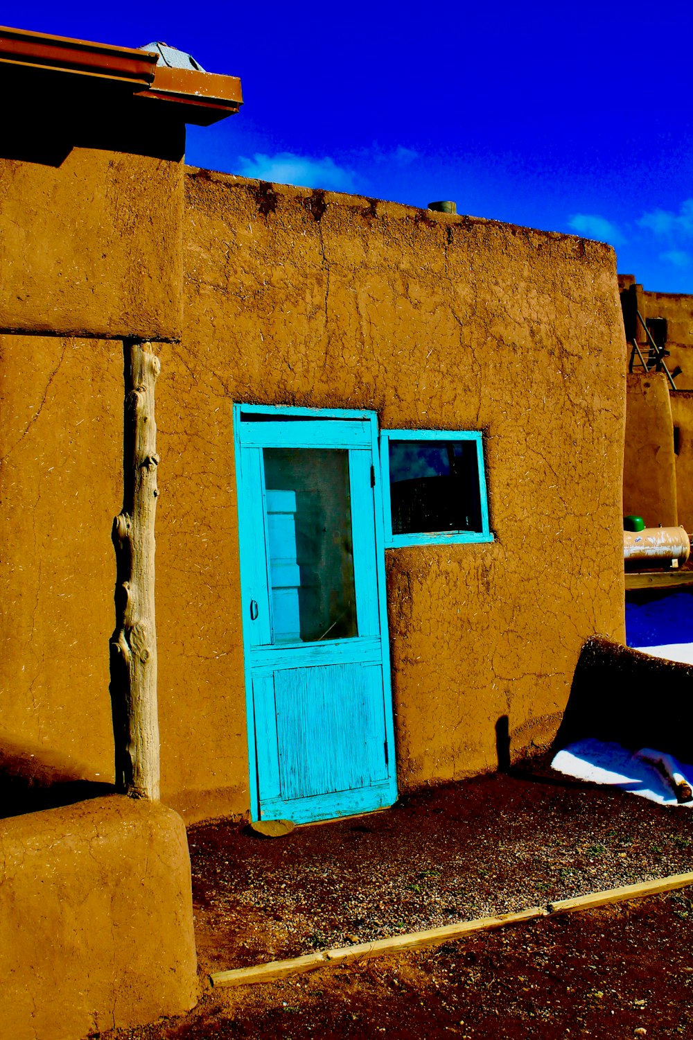 blue wooden framed glass window