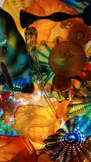 A vibrant collection of handcrafted resin art pieces arranged artistically.