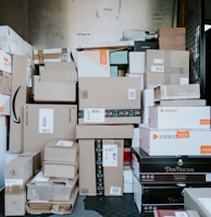 brown cardboard boxes on black plastic crate