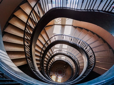black spiral staircase with black metal railings