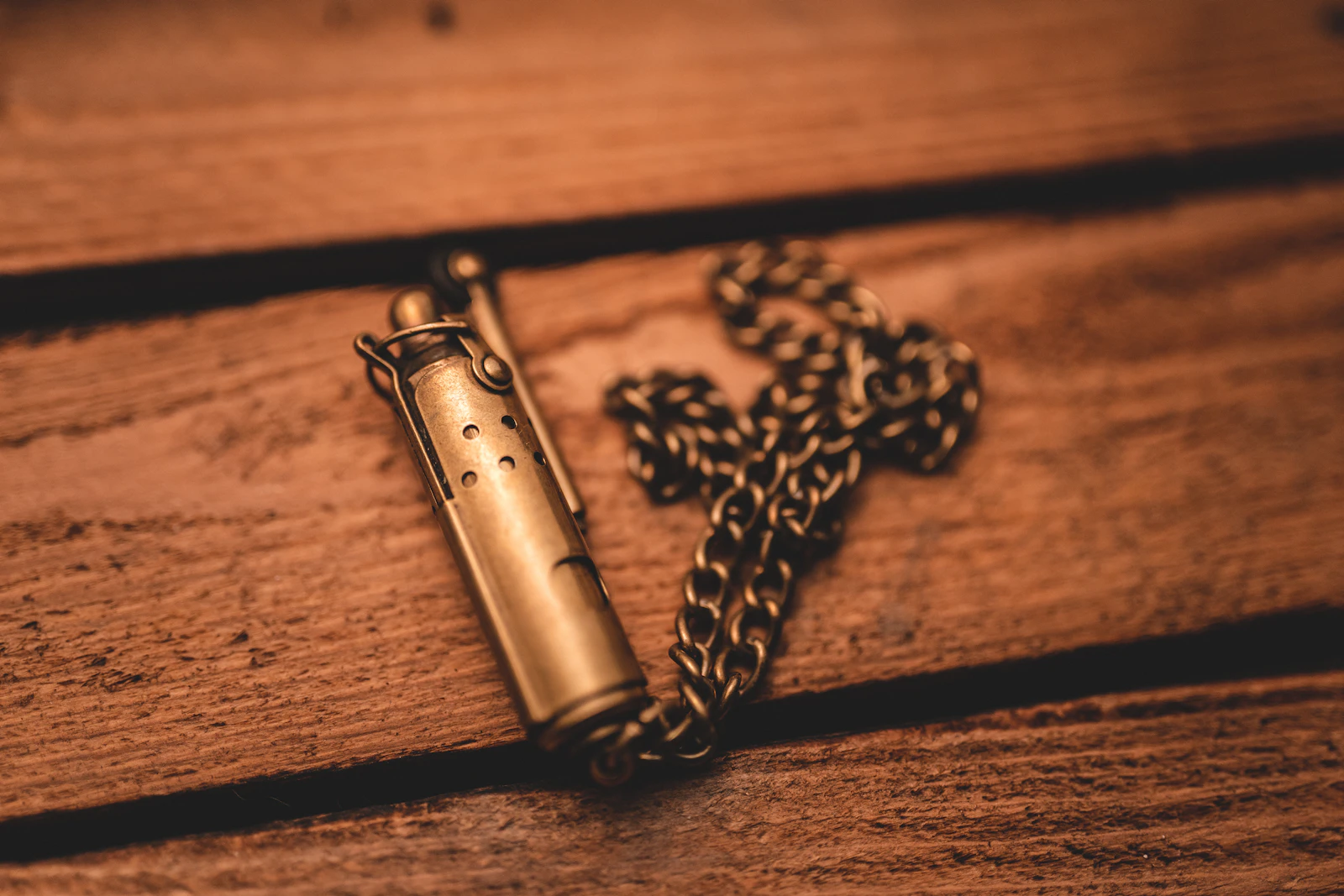 Close-up of a polished brass whistle