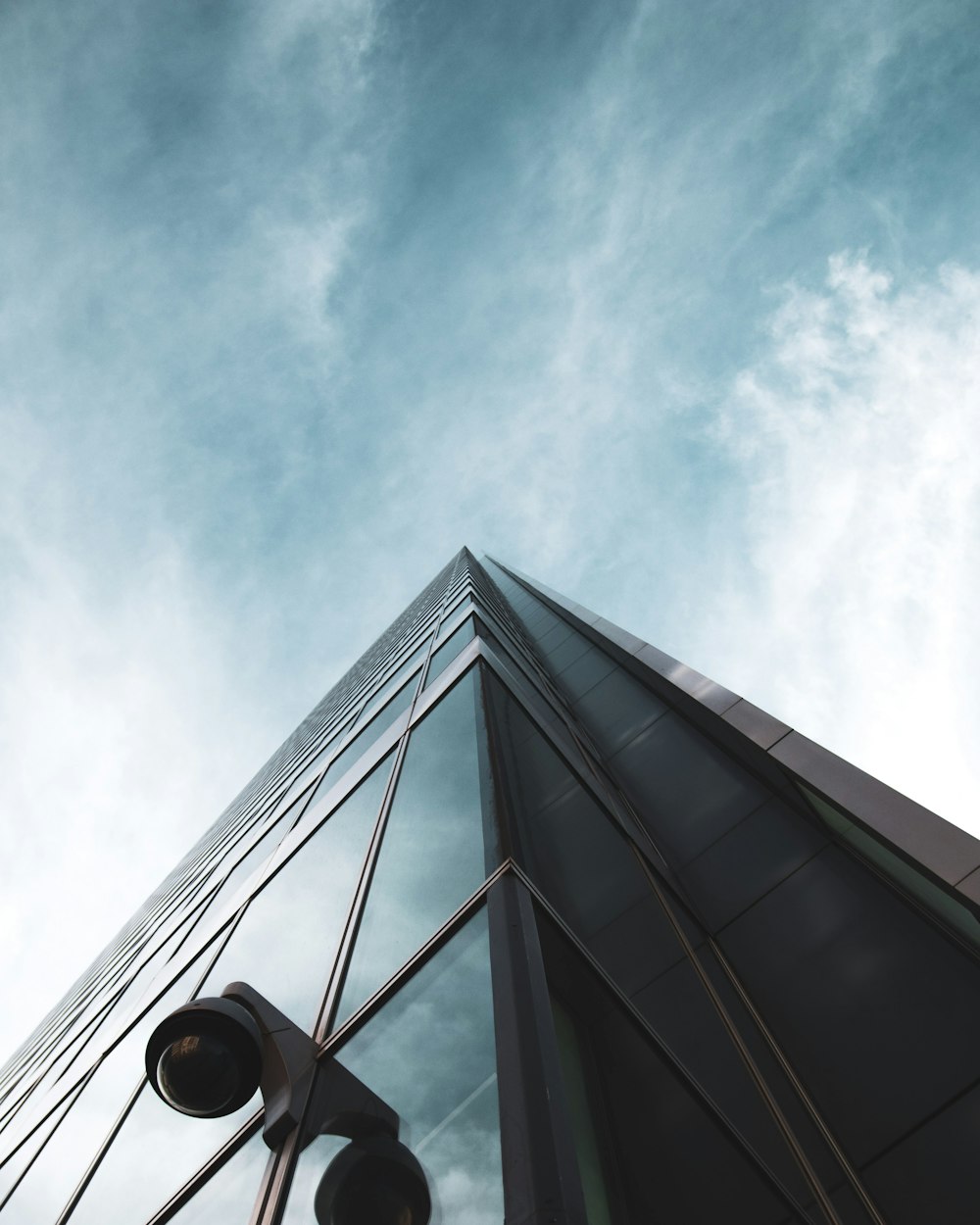 low angle photography of building under blue sky during daytime