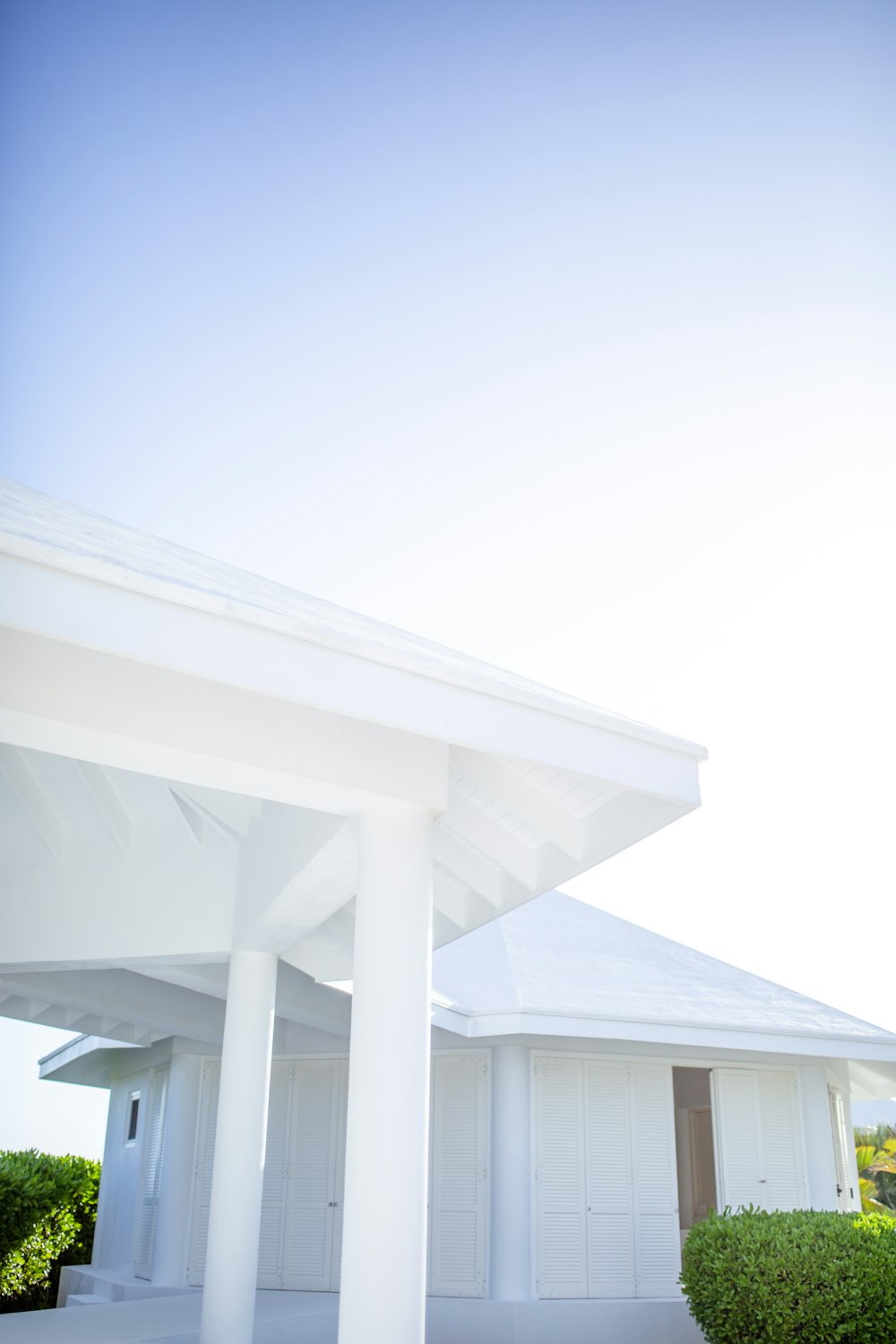 white concrete building under blue sky during daytime