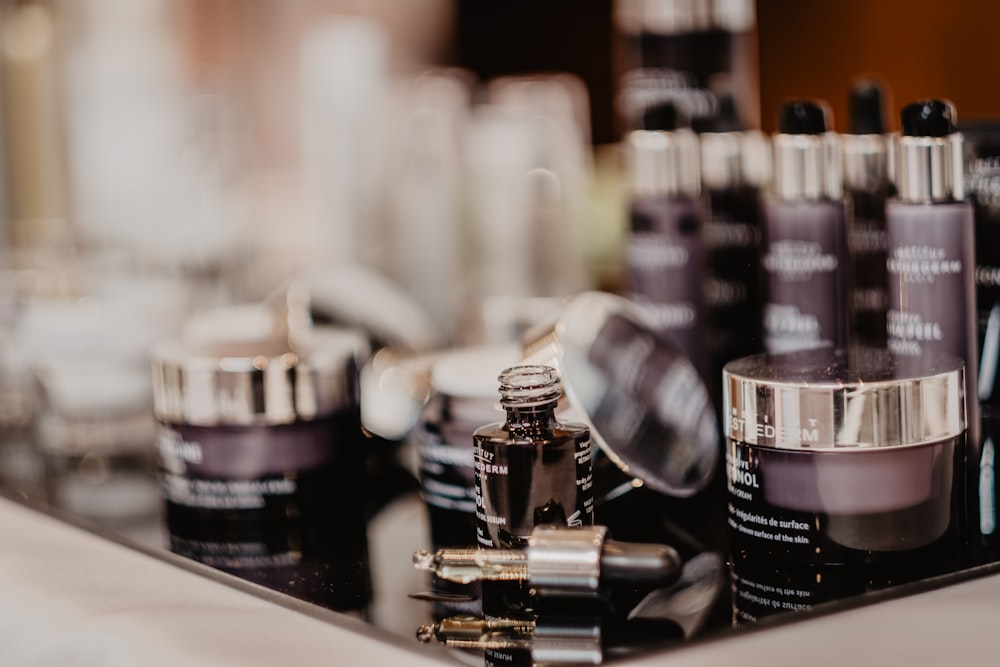 black and silver nail polish bottle