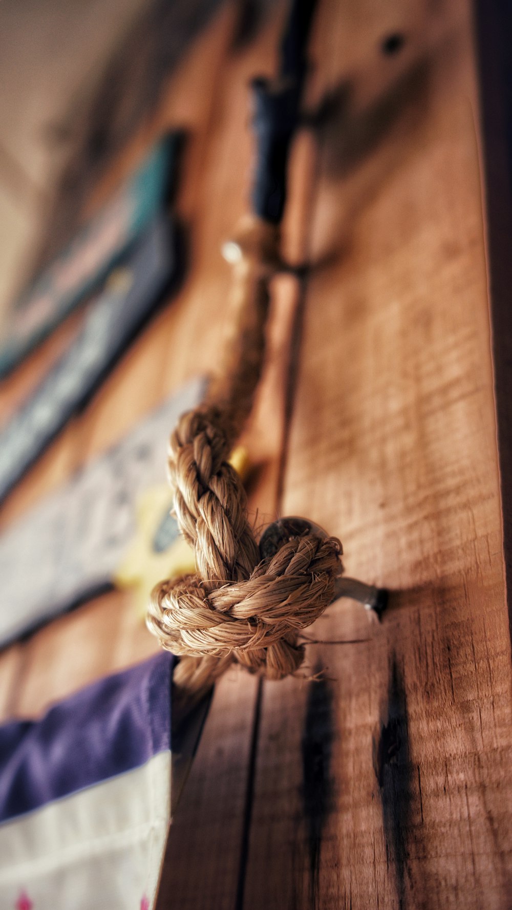 brown rope on brown wooden surface