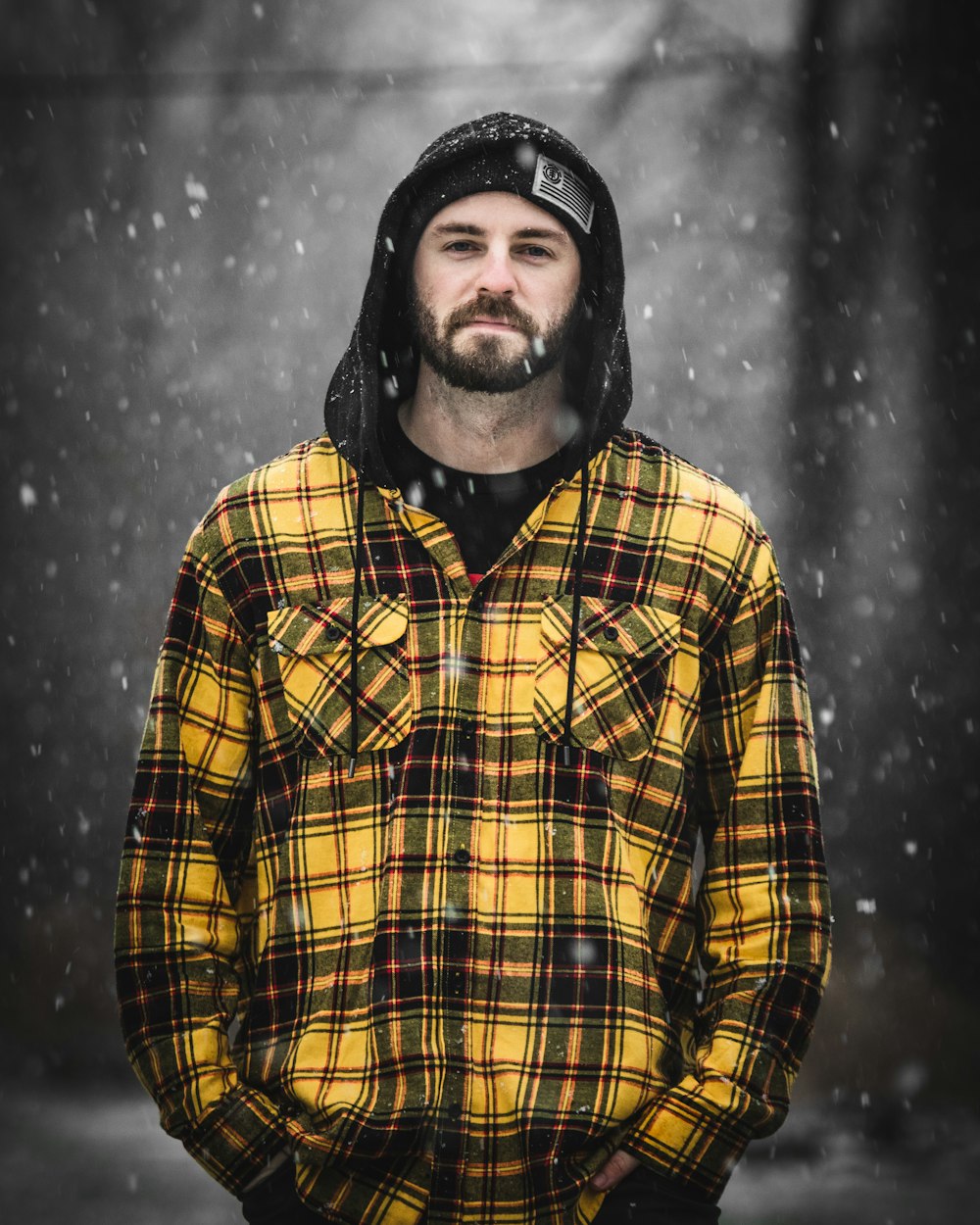 man in yellow and black plaid dress shirt