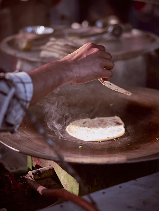 Flatbread cooking on a hot griddle