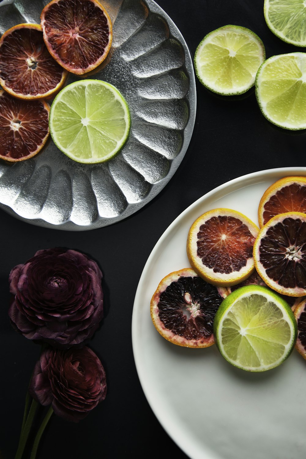 sliced lemon on white ceramic plate