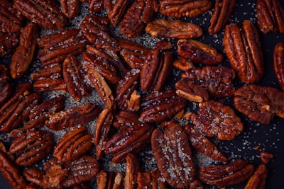 brown and black coffee beans pecan zoom background