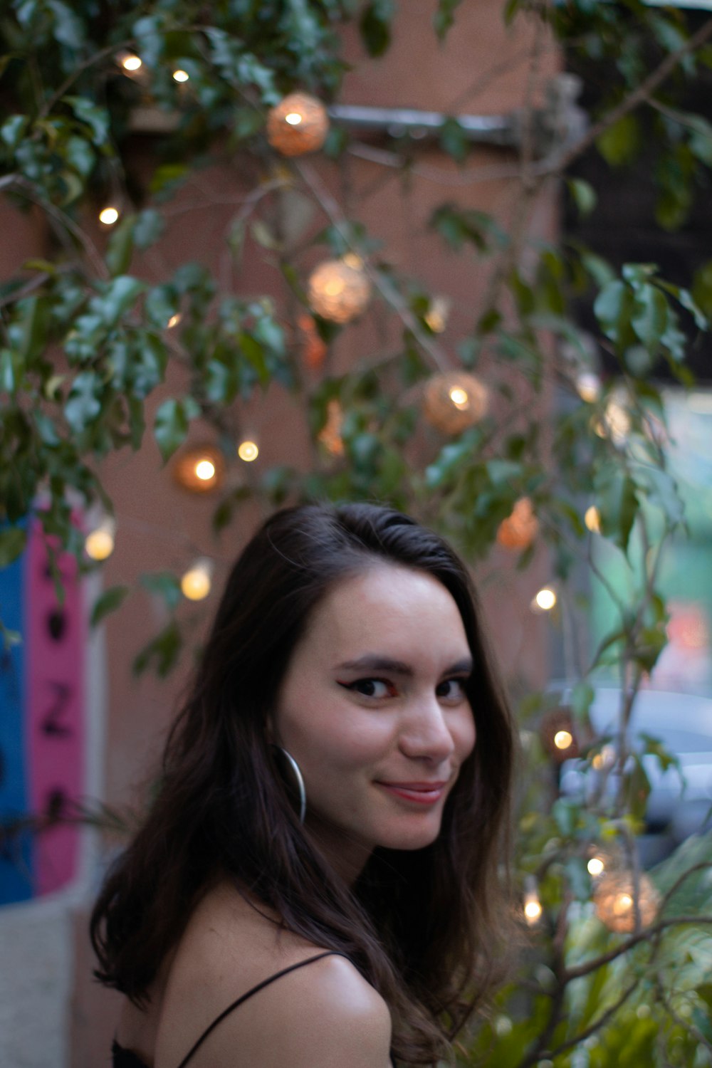 woman in white shirt smiling