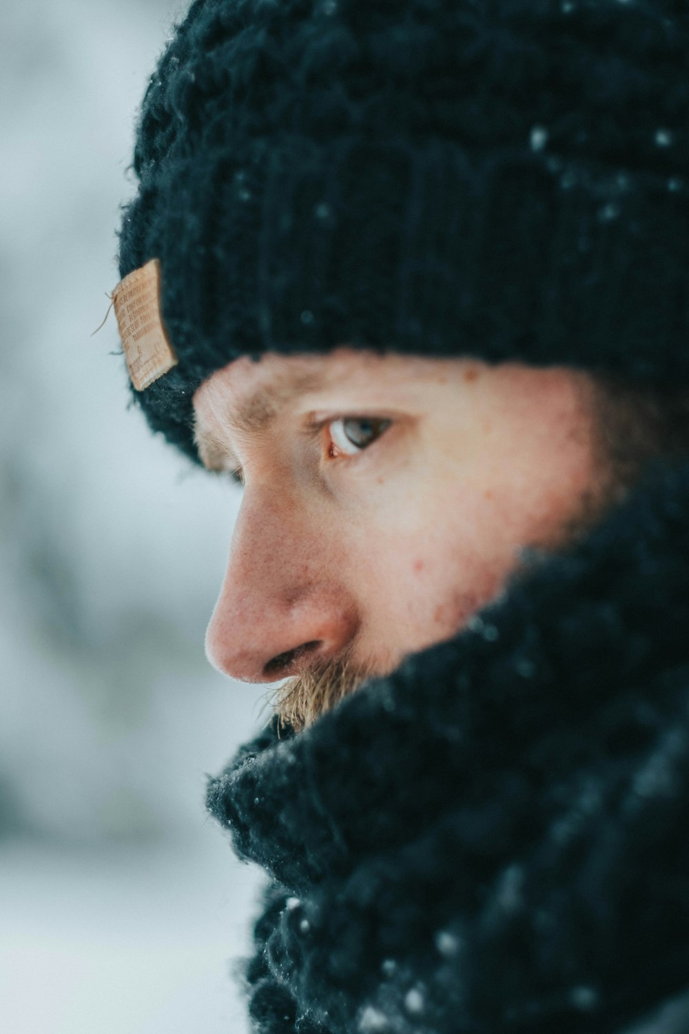 man in black knit cap