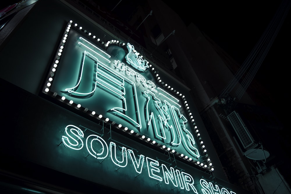 low light photography of UNKs neon light signage