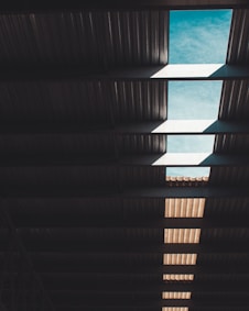 brown wooden ceiling with light fixture