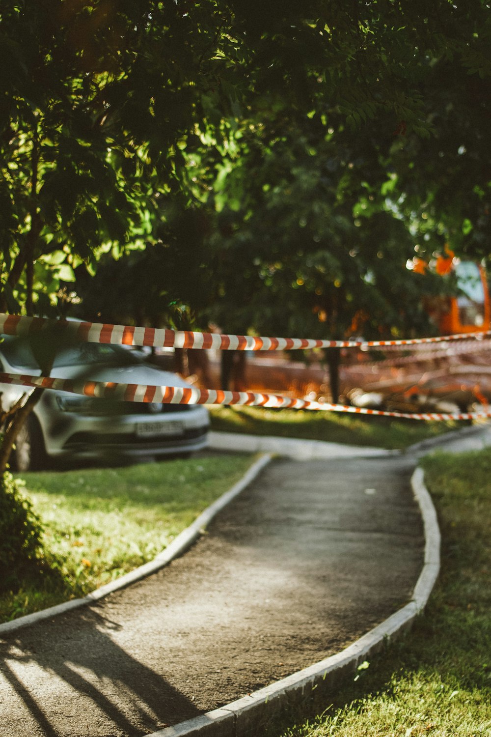 black and orange car on road during daytime