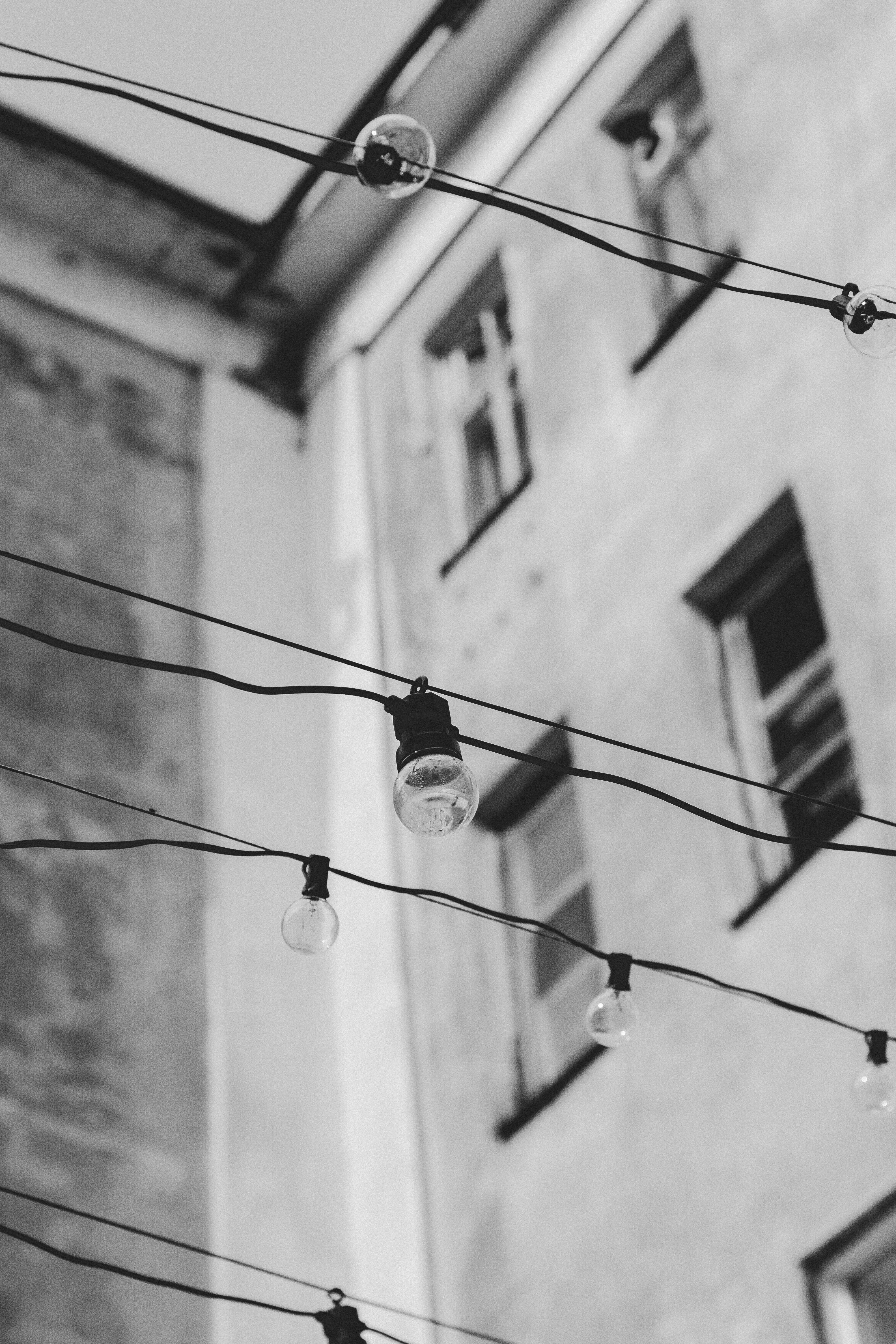 grayscale photo of string light