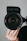 black nikon dslr camera on persons hand