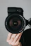 black nikon dslr camera on persons hand