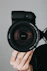 black nikon dslr camera on persons hand