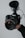 A satisfied customer holding camera equipment rented from Sahasra Sree Creations.