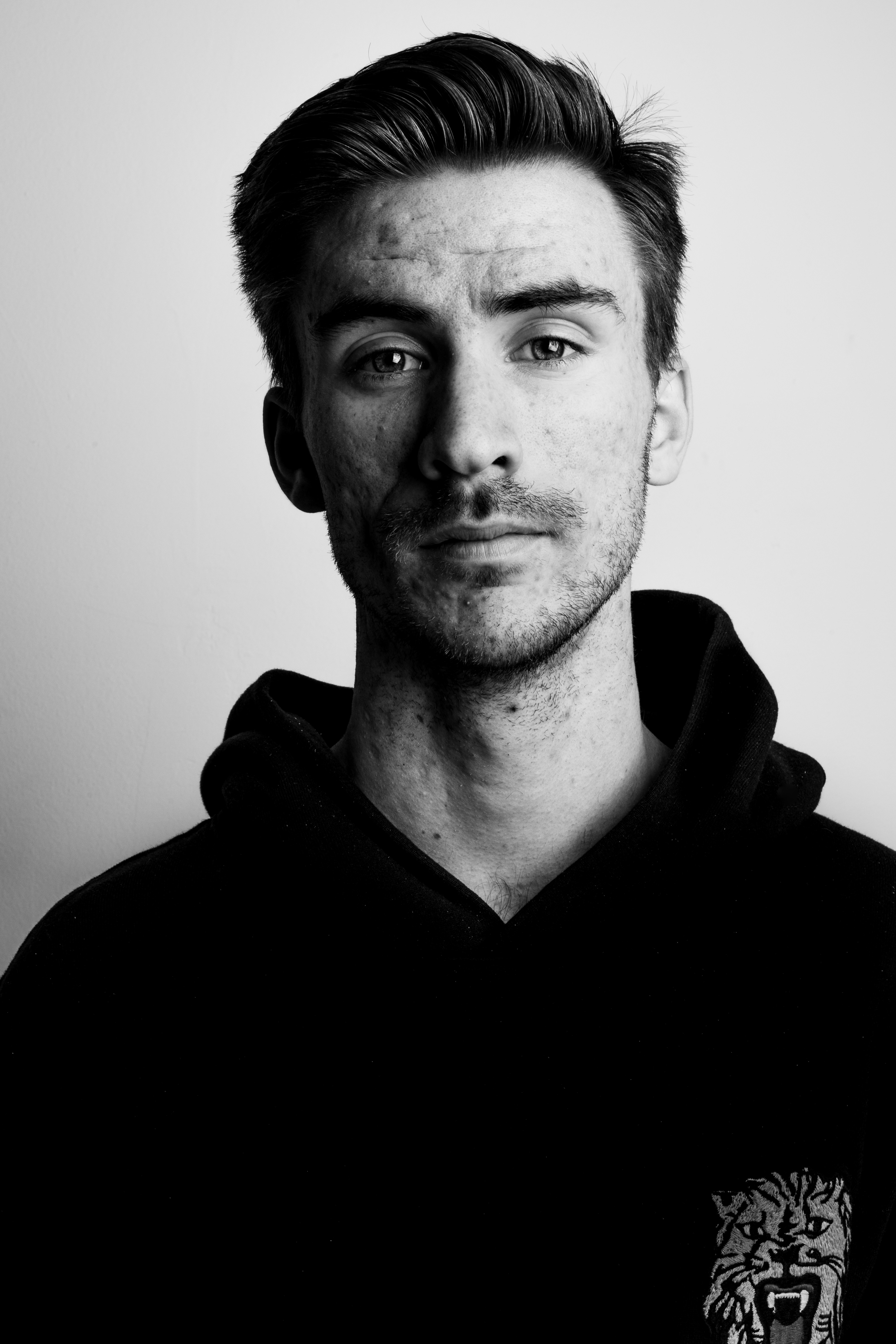 Man in black hoodie in grayscale photography photo – Free Grey Image on ...