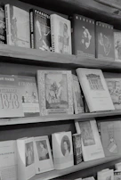 Books and cultural artifacts arranged on a shelf, symbolizing the fusion of knowledge and heritage.