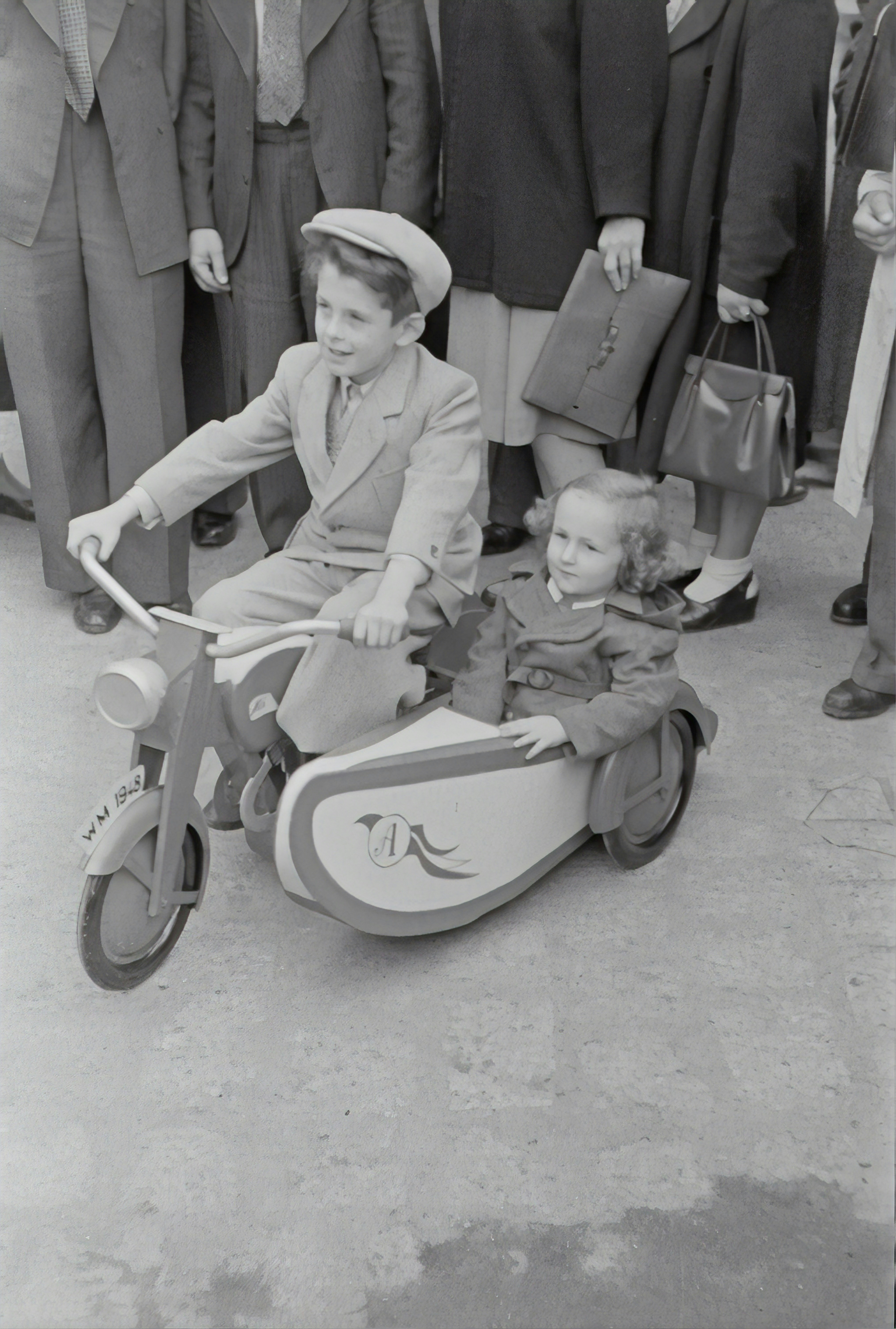 Little boy with sidecar machine.1948