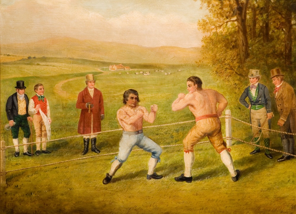 3 men playing golf on green grass field during daytime