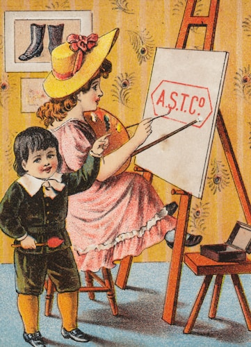 A vintage illustration of a young girl and boy engaging in an art activity. The girl, wearing a yellow hat and pink dress, is seated on a stool while painting on an easel. The boy, dressed in a dark suit with yellow socks, stands beside her holding a brush and pointing at the canvas. The easel displays the text 'A.S.T. Co'. The room's wallpaper features a floral pattern, and a small table next to them holds an open box. A framed artwork, depicting a pair of boots, hangs on the wall.