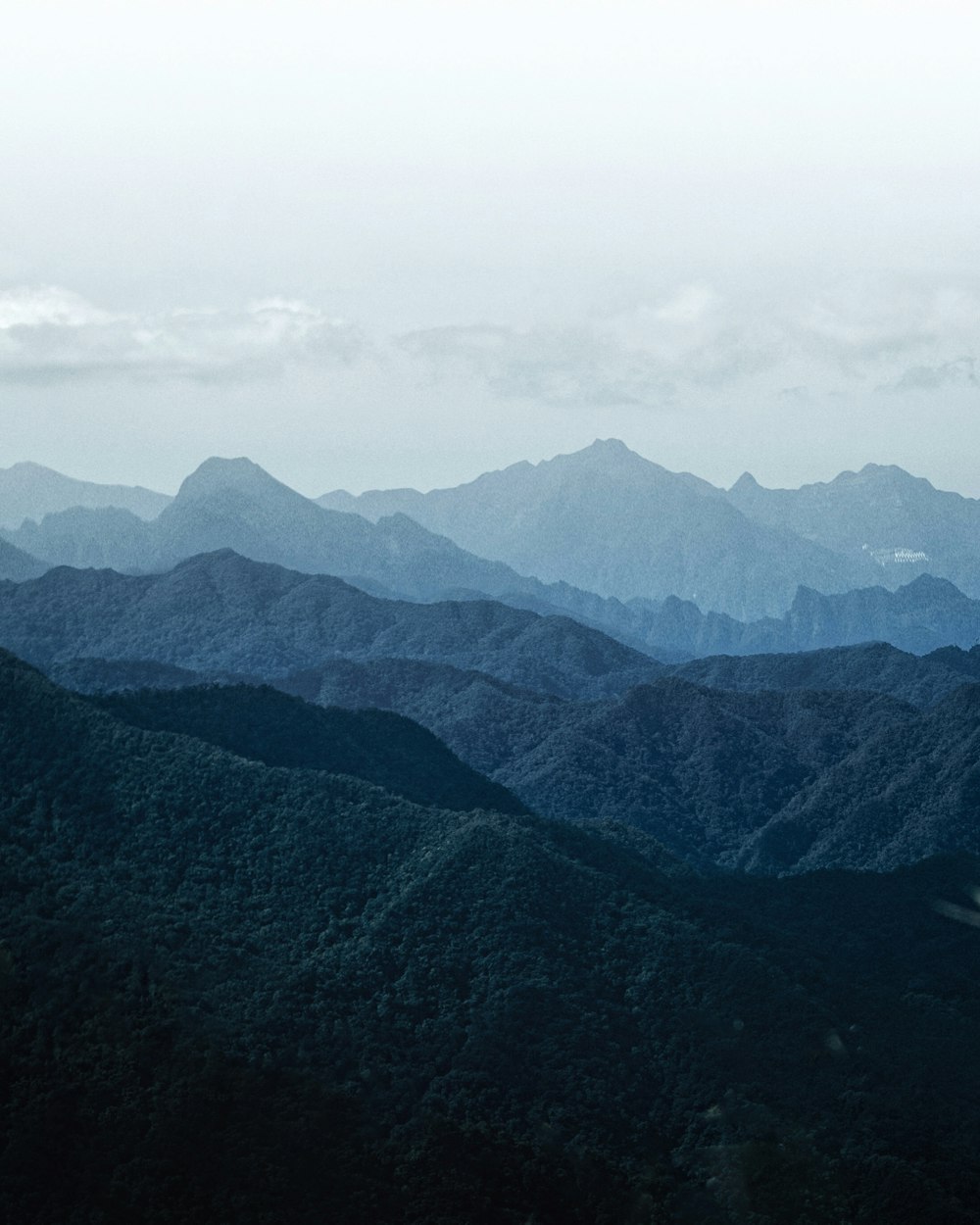 green mountains under white sky during daytime