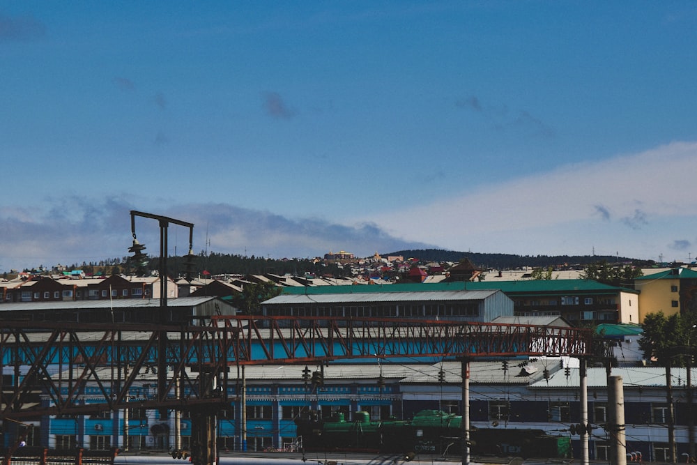 white and green concrete building under blue sky during daytime