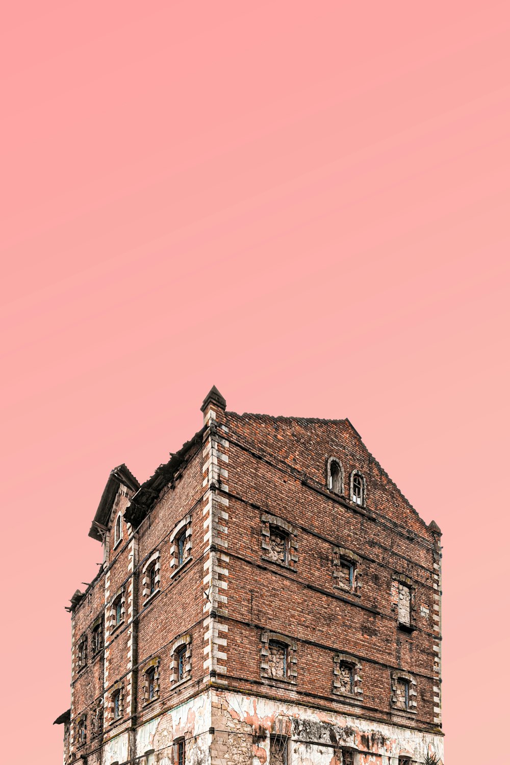 brown concrete building under blue sky during daytime